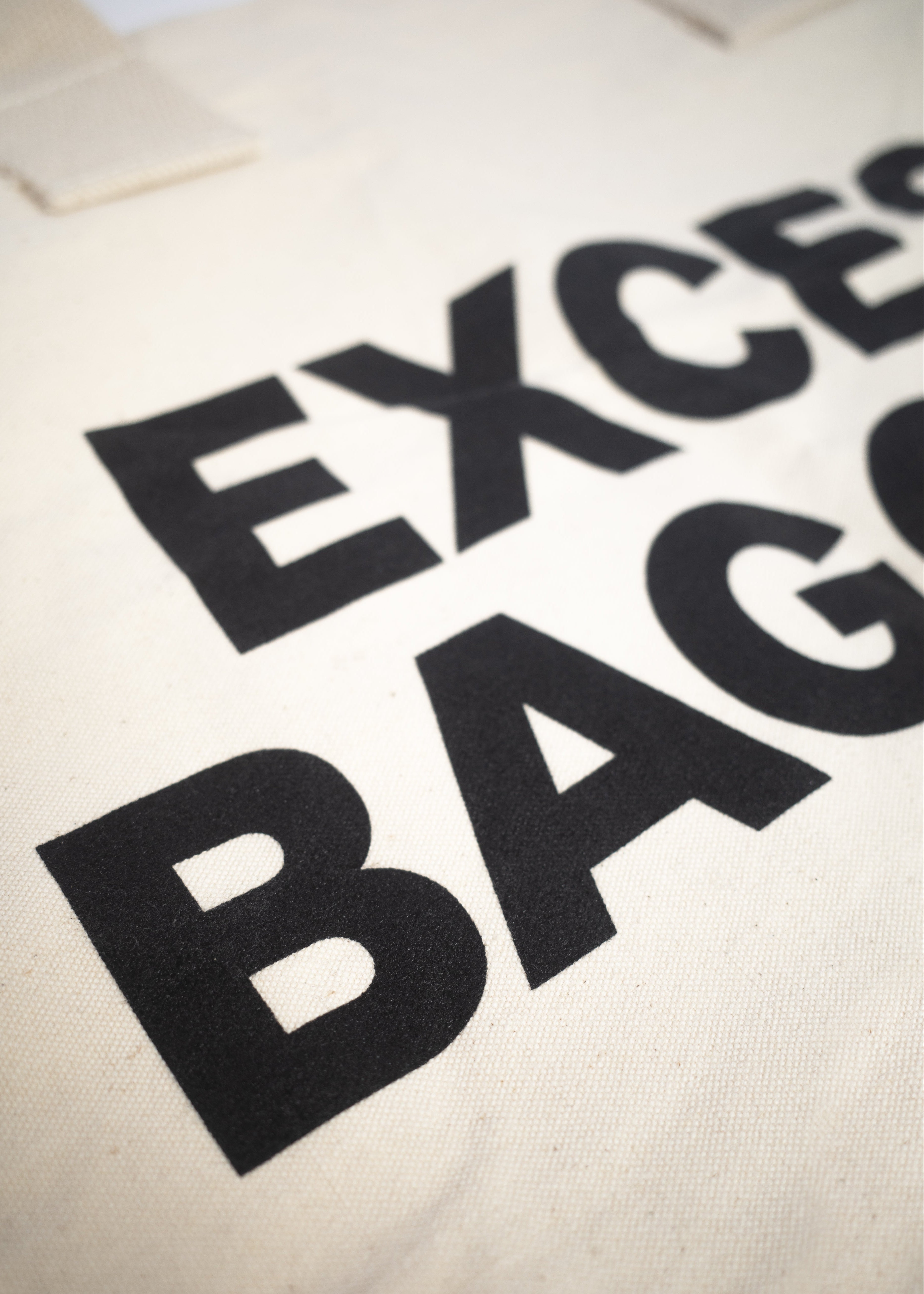 EXCESS BAGGAGE — WHITE