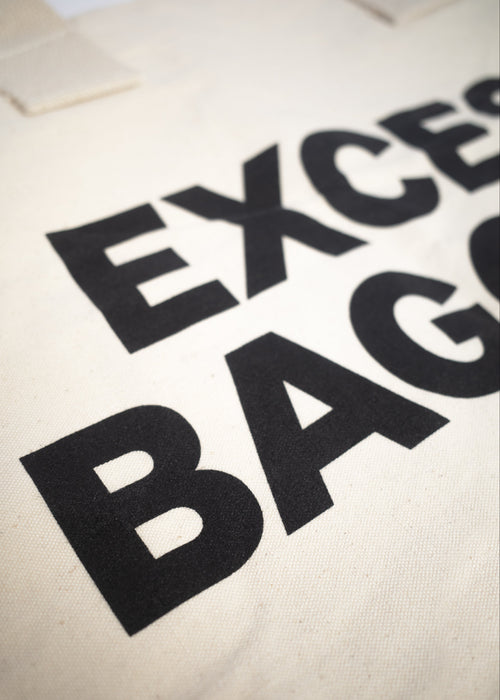 EXCESS BAGGAGE — WHITE