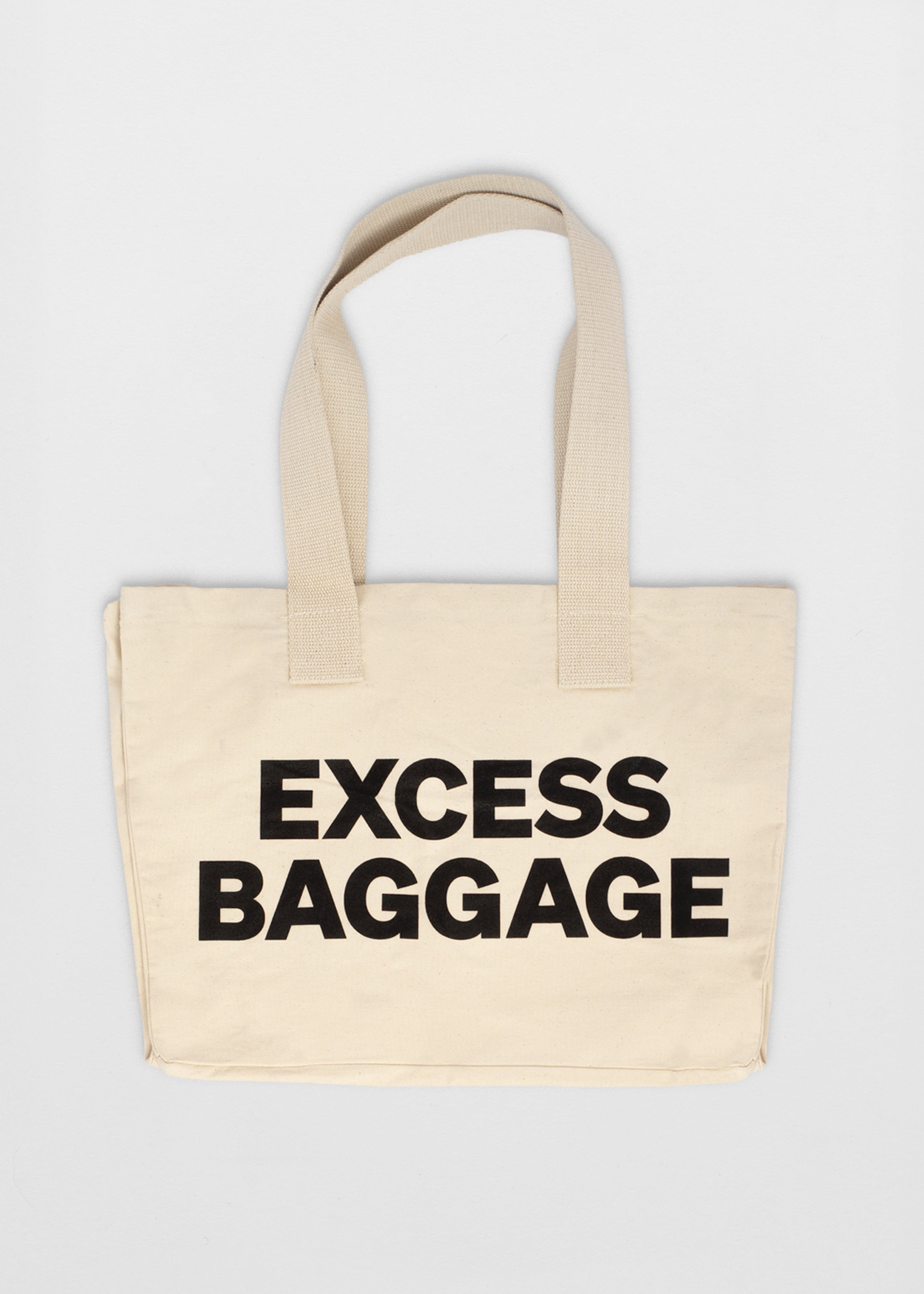 EXCESS BAGGAGE — WHITE