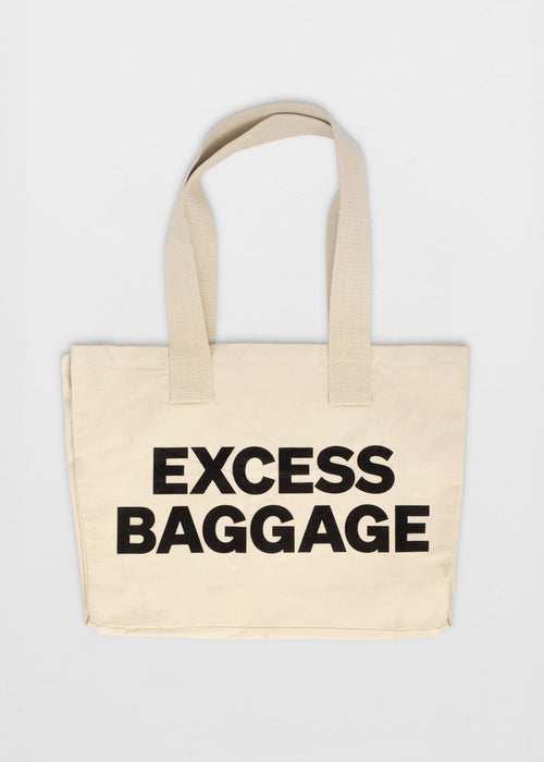 EXCESS BAGGAGE — WHITE